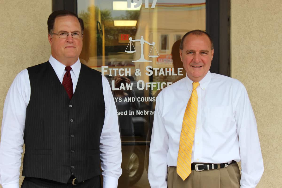 Thomas Fitch and Robert Stahle outside the Fitch and Stahle Law Office in South Sioux City